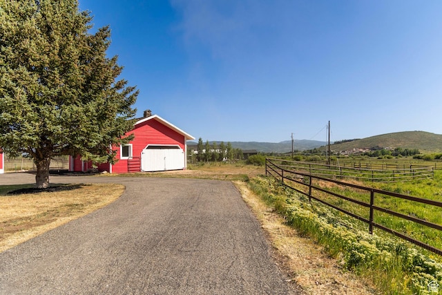 266 Old Ranch Rd W, Park City, UT 84098 - view of asphalt driveway featuring a mountain view and a rural view
