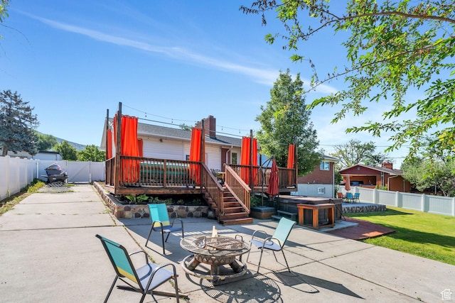780 Loader Dr, Pleasant Grove, UT 84062 - fenced backyard with a fire pit, a patio area, and a wooden deck