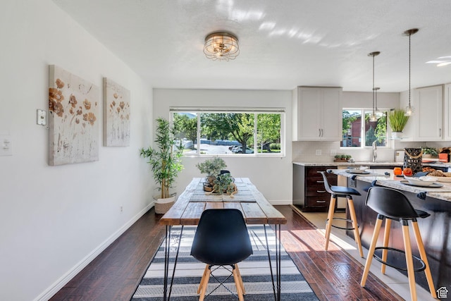 780 Loader Dr, Pleasant Grove, UT 84062 - dining space featuring dark wood-style floors and baseboards