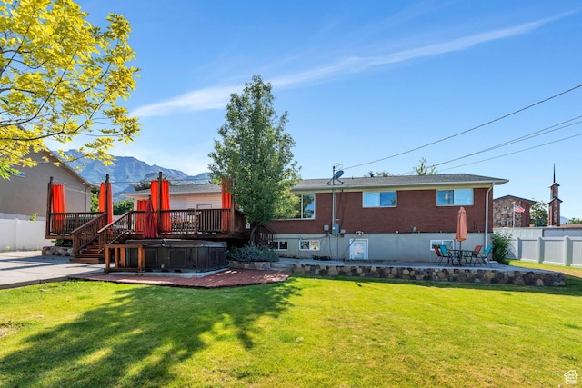 780 Loader Dr, Pleasant Grove, UT 84062 - view of yard featuring a hot tub, a patio, and a deck with mountain view