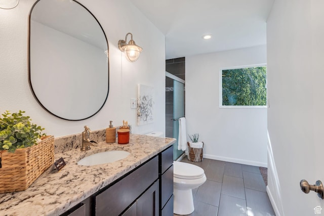 780 Loader Dr, Pleasant Grove, UT 84062 - bathroom featuring a shower with shower door, vanity, tile patterned floors, and recessed lighting