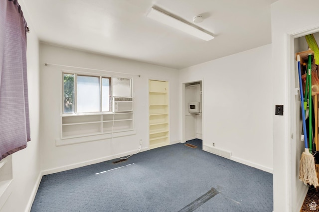 1579 S 1000 W, Salt Lake City, UT 84104 - unfurnished room featuring a smoke detector, dark carpet, and cooling unit