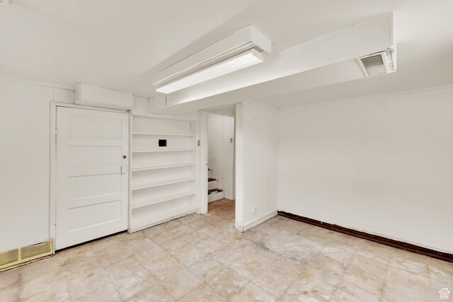1579 S 1000 W, Salt Lake City, UT 84104 - finished below grade area featuring light floors and baseboards