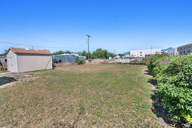 1579 S 1000 W, Salt Lake City, UT 84104 - view of grassy yard with a storage unit