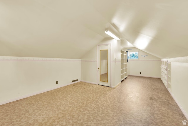 1579 S 1000 W, Salt Lake City, UT 84104 - additional living space with lofted ceiling and baseboards