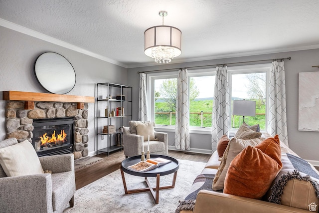 983 Mountain Willow Ln, Park City, UT 84098 - living area with a textured ceiling, ornamental molding, a fireplace, plenty of natural light, and wood finished floors