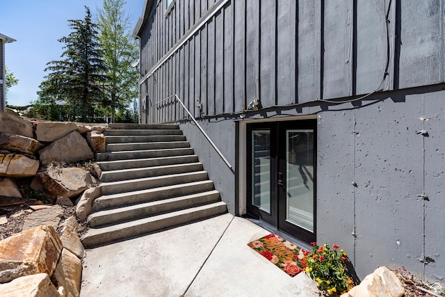 983 Mountain Willow Ln, Park City, UT 84098 - doorway to property featuring board and batten siding and french doors