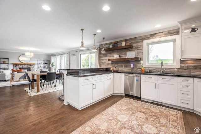 983 Mountain Willow Ln, Park City, UT 84098 - kitchen with dishwasher, decorative backsplash, dark countertops, a peninsula, and recessed lighting
