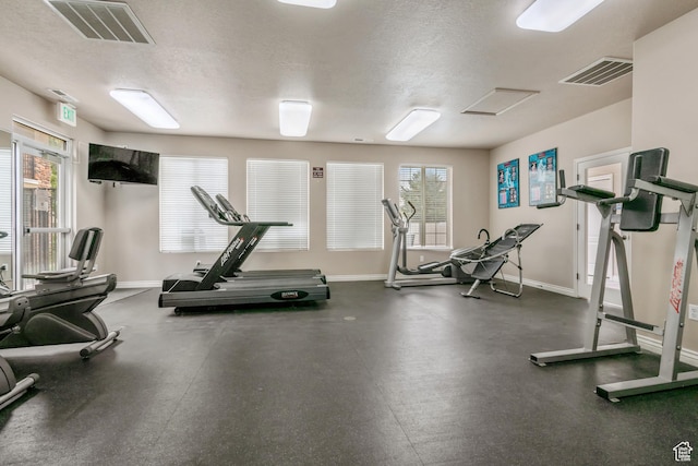 211 E Spencer Peak Way Unit H6, Draper, UT 84020 - workout area with healthy amount of natural light and a textured ceiling