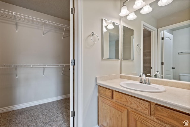 211 E Spencer Peak Way Unit H6, Draper, UT 84020 - bathroom with vanity and a spacious closet