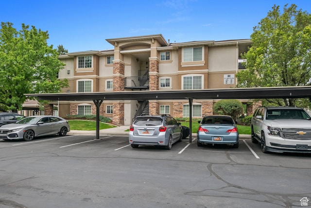 211 E Spencer Peak Way Unit H6, Draper, UT 84020 - view of property with stairway and covered parking