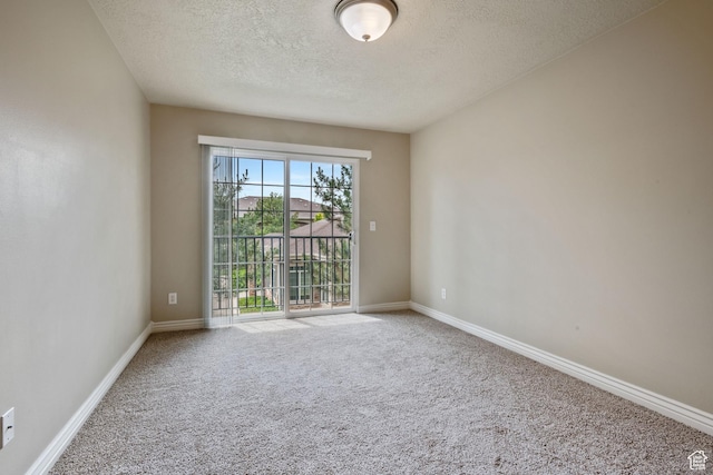 211 E Spencer Peak Way Unit H6, Draper, UT 84020 - carpeted spare room featuring a textured ceiling and baseboards