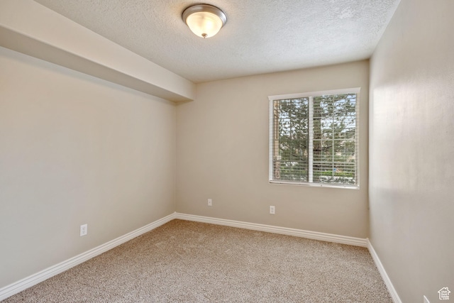 211 E Spencer Peak Way Unit H6, Draper, UT 84020 - unfurnished room with carpet and a textured ceiling