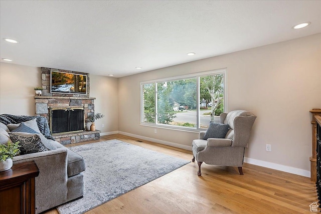 315 E 900 N, Brigham City, UT 84302 - living area with a fireplace, recessed lighting, and wood finished floors