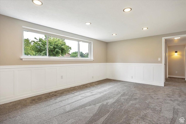 315 E 900 N, Brigham City, UT 84302 - unfurnished room with carpet floors, wainscoting, recessed lighting, and a decorative wall