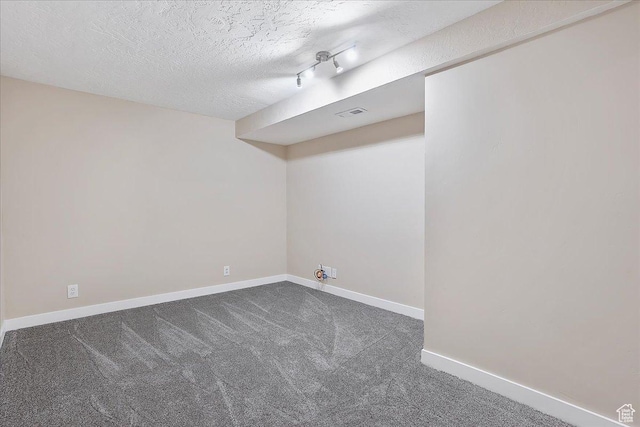 315 E 900 N, Brigham City, UT 84302 - finished below grade area featuring dark colored carpet and a textured ceiling