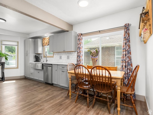 1116 S Liberty Ave, Ogden, UT 84404 - dining space featuring wood finished floors and plenty of natural light