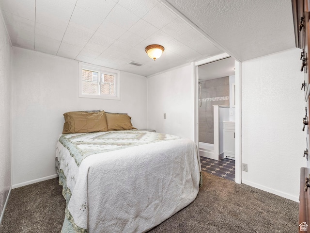 1116 S Liberty Ave, Ogden, UT 84404 - bedroom featuring dark carpet and ensuite bath