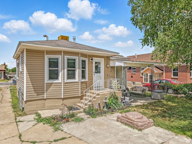 1116 S Liberty Ave, Ogden, UT 84404 - view of front of home with a patio area
