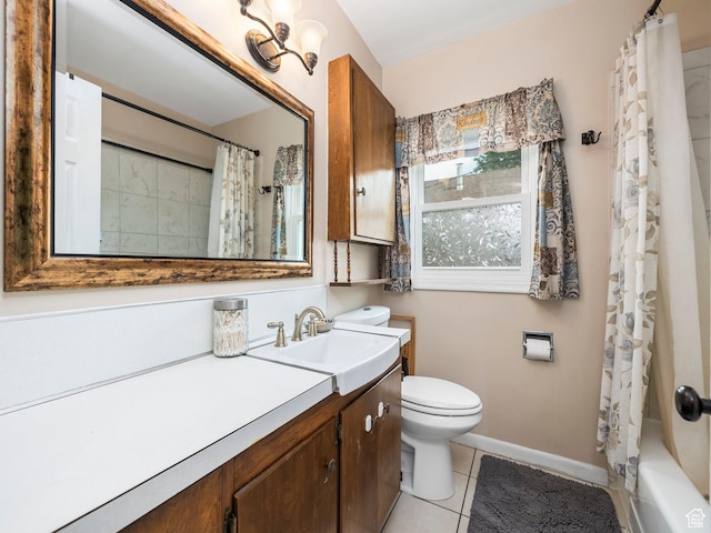 1116 S Liberty Ave, Ogden, UT 84404 - full bathroom featuring vanity, tile patterned floors, and shower / bath combo with shower curtain