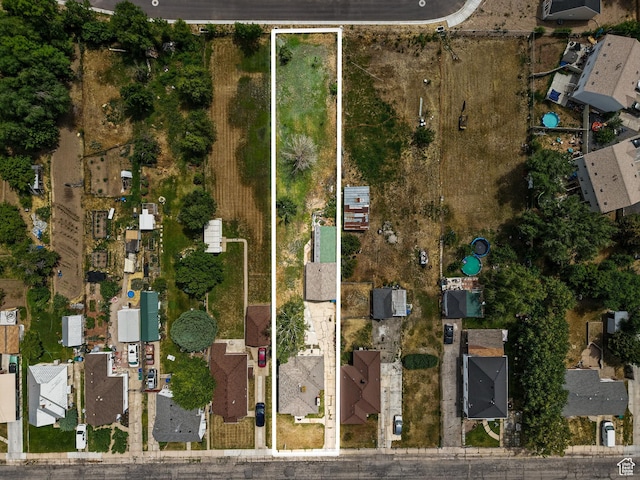 1116 S Liberty Ave, Ogden, UT 84404 - aerial overview of property's location featuring property parcel outlined and nearby suburban area