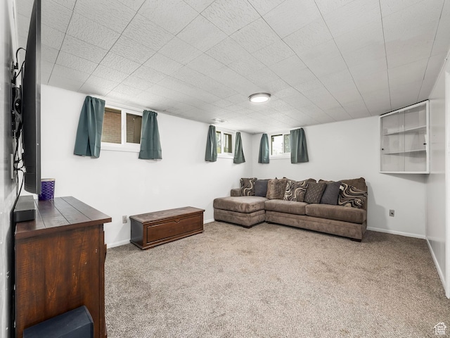 1116 S Liberty Ave, Ogden, UT 84404 - carpeted living area featuring baseboards