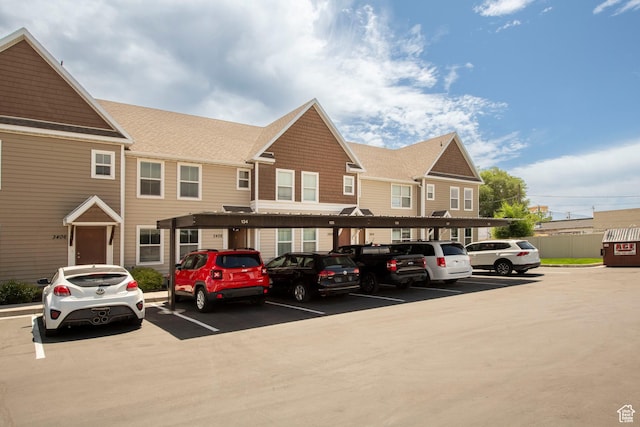3408 S Carrick Dr W, South Salt Lake, UT 84115 - view of building exterior with covered and uncovered parking