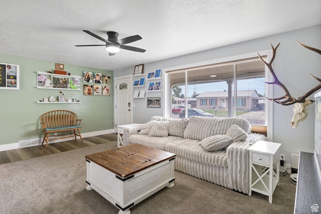 4895 W Pavant Ave, West Valley City, UT 84120 - carpeted living room with ceiling fan and a textured ceiling