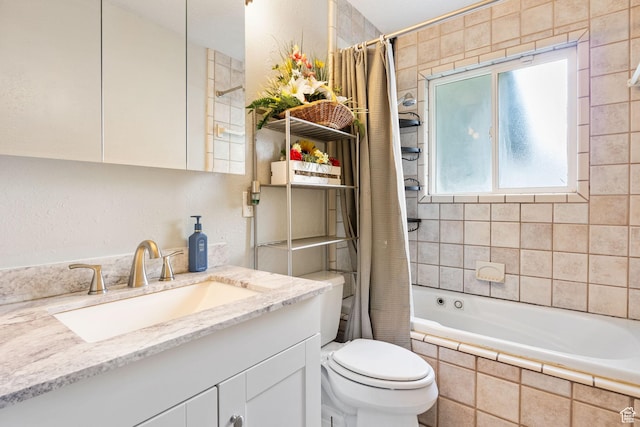 4895 W Pavant Ave, West Valley City, UT 84120 - bathroom featuring tiled shower / bath, vanity, and a textured wall