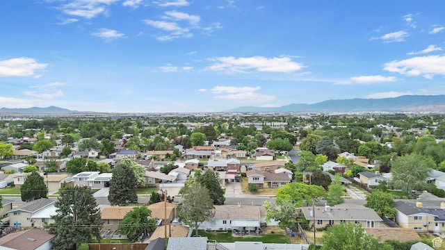 4895 W Pavant Ave, West Valley City, UT 84120 - aerial perspective of suburban area featuring a mountainous background