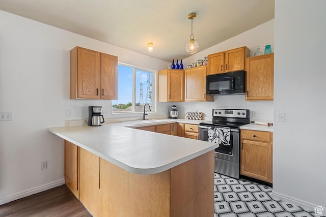 387 W 1900 S, Clearfield, UT 84015 - kitchen featuring black microwave, stainless steel range with electric cooktop, a peninsula, light countertops, and vaulted ceiling