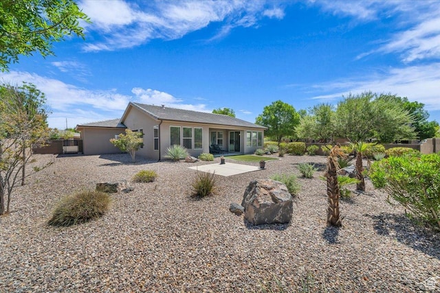 424 N Highland Pkwy, Washington, UT 84780 - rear view of house featuring a patio area and stucco siding