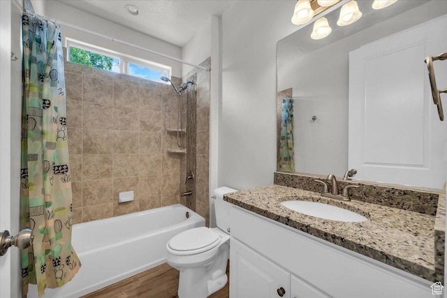 424 N Highland Pkwy, Washington, UT 84780 - bathroom featuring shower / bath combo with shower curtain, vanity, and wood finished floors