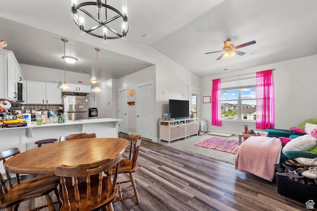 4064 W 1850 N Unit F302, Lehi, UT 84043 - dining area featuring lofted ceiling, dark wood-style flooring, a chandelier, and ceiling fan