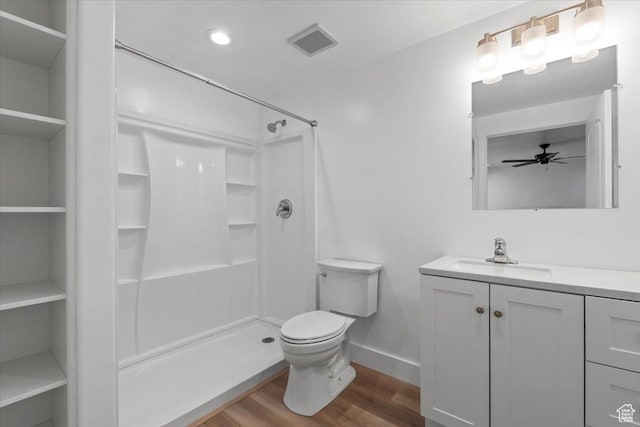 1734 E Muss Dr, Eagle Mountain, UT 84005 - bathroom featuring wood finished floors, vanity, a shower, and a ceiling fan