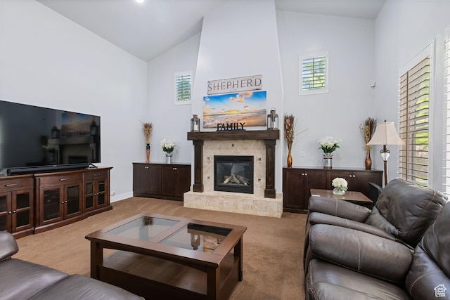 6923 W Long Ridge Dr S, Herriman, UT 84096 - living area with carpet floors, high vaulted ceiling, a glass covered fireplace, and plenty of natural light
