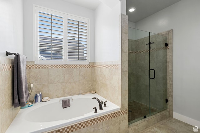 6923 W Long Ridge Dr S, Herriman, UT 84096 - bathroom with a bath, a shower stall, and tile patterned floors