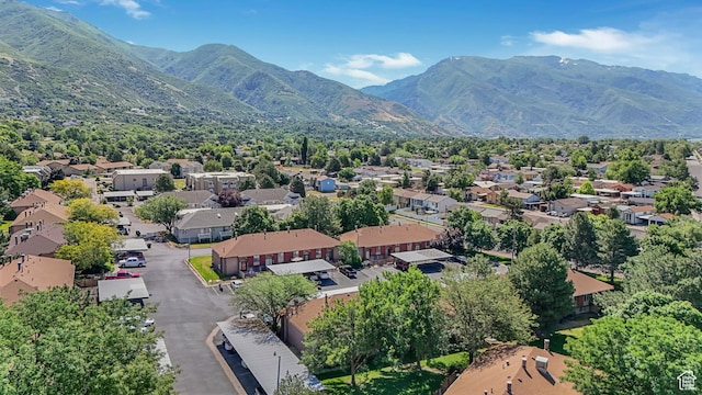 5667 S Aspen Ct E, South Ogden, UT 84403 - aerial view of residential area featuring a mountain backdrop