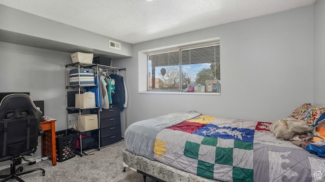 5667 S Aspen Ct E, South Ogden, UT 84403 - carpeted bedroom with a closet and a desk