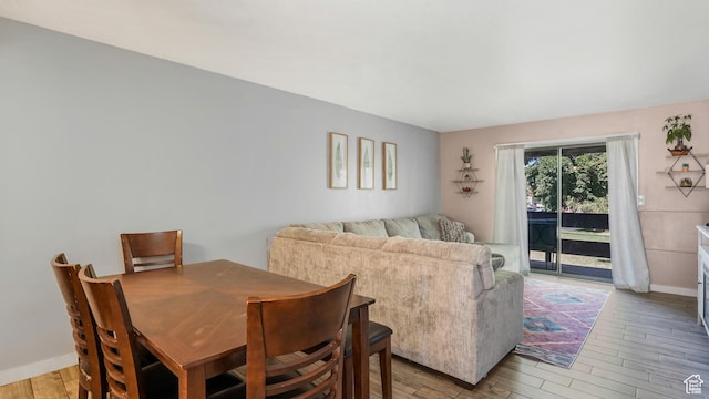 5667 S Aspen Ct E, South Ogden, UT 84403 - dining space featuring light wood-type flooring