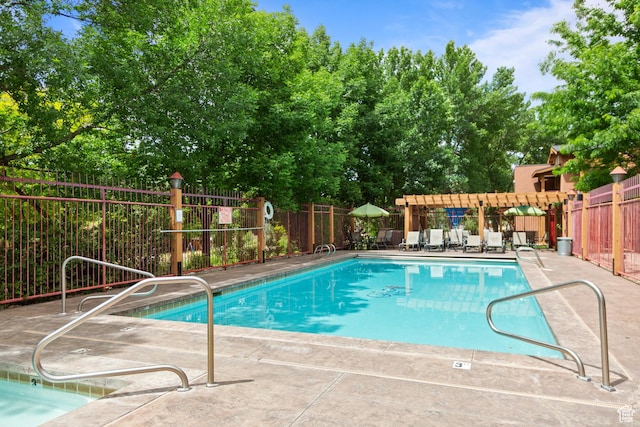 212 100 W 200 S Unit 212, Moab, UT 84532 - community pool featuring a patio and view of wooded area