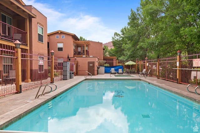 212 100 W 200 S Unit 212, Moab, UT 84532 - community pool featuring a patio area