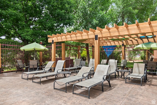 212 100 W 200 S Unit 212, Moab, UT 84532 - view of patio featuring a pergola and outdoor dining space