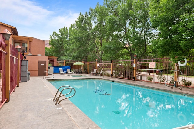 212 100 W 200 S Unit 212, Moab, UT 84532 - community pool featuring a patio