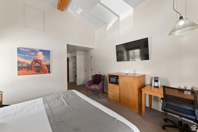 212 100 W 200 S Unit 212, Moab, UT 84532 - carpeted bedroom featuring beamed ceiling and high vaulted ceiling