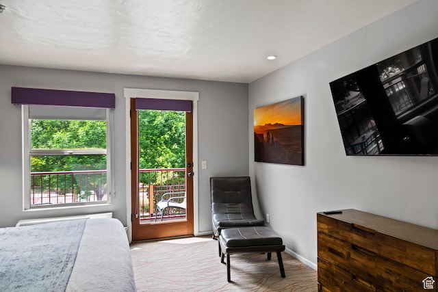 212 100 W 200 S Unit 212, Moab, UT 84532 - bedroom featuring access to exterior and baseboards