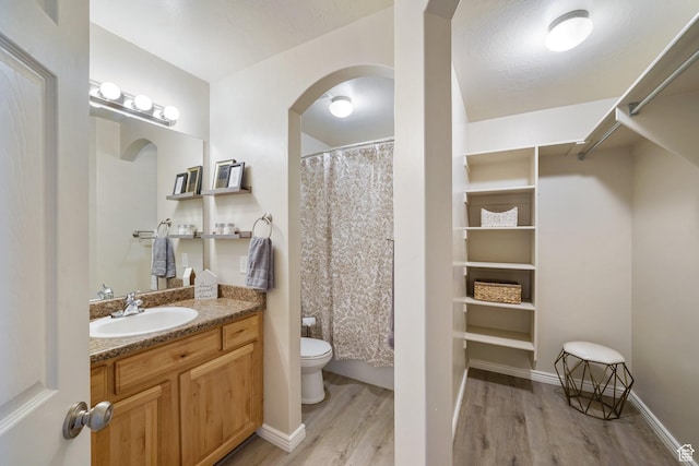 2051 E 1180 S, Spanish Fork, UT 84660 - full bath with wood finished floors, vanity, and a shower with shower curtain