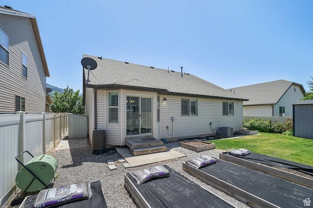 2051 E 1180 S, Spanish Fork, UT 84660 - back of property featuring a fenced backyard and a shingled roof