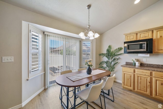 2051 E 1180 S, Spanish Fork, UT 84660 - dining room with a chandelier, light wood-style flooring, and vaulted ceiling