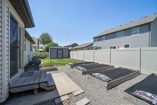 2051 E 1180 S, Spanish Fork, UT 84660 - fenced backyard with a shed, a garden, and a residential view